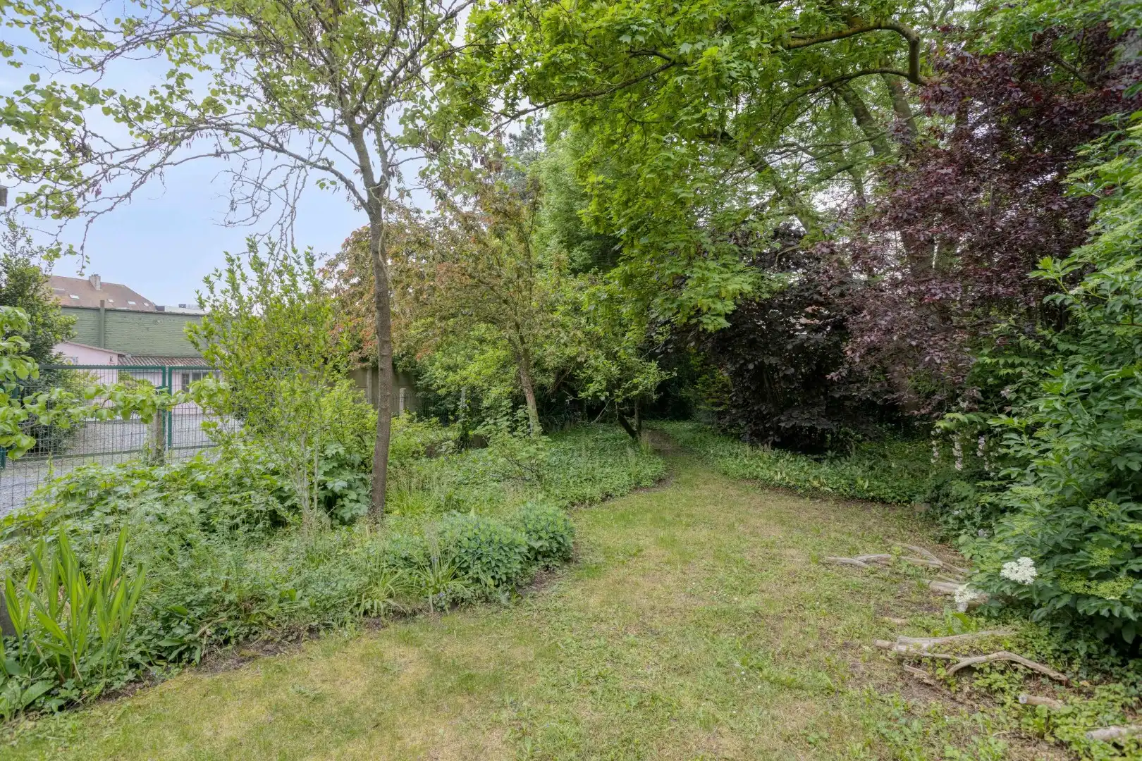 Te renoveren woning met tuin en garage in het centrum van Menen! foto 25