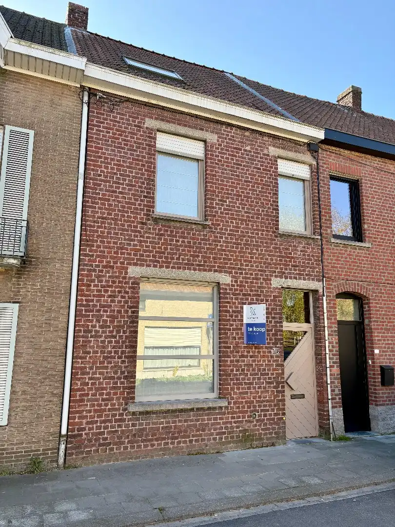 Centraal gelegen woning met 3 slaapkamers en tuin te koop in Kuurne foto 1