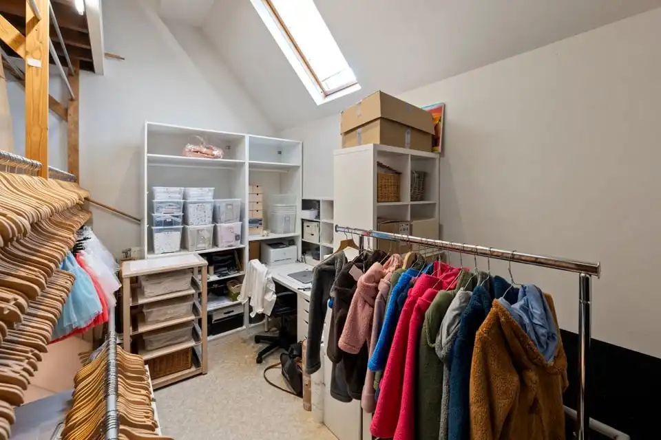 KNAP HANDELSPAND MET TWEE APART VERHUURDE APPARTEMENTEN IN HET CENTRUM VAN SINT-TRUIDEN foto 16