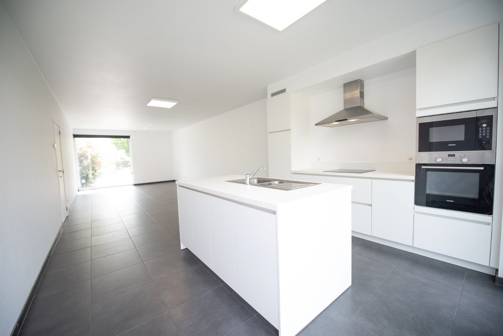 Verrassend ruime BEN-woning TE HUUR op zeer mooie ligging te Waregem. foto 4