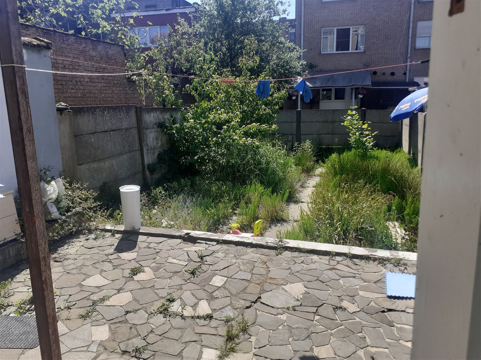 Woning ingedeeld in 3 verhuurde appartementen foto 13