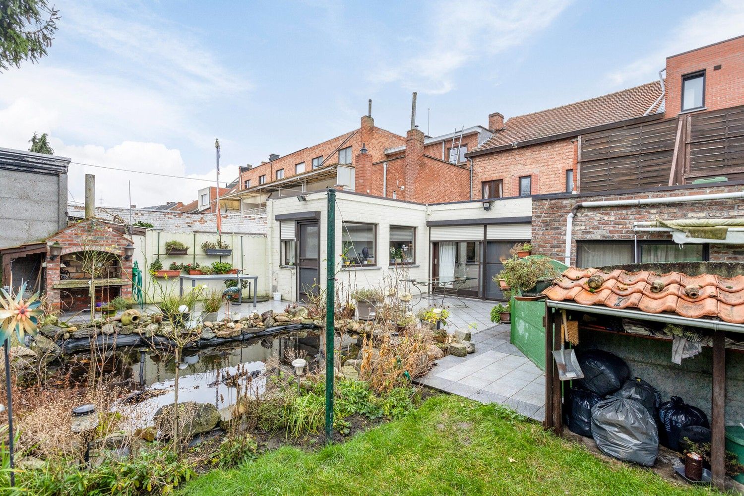 Woning met grote tuin en twee appartementen te koop in het centrum! foto 26