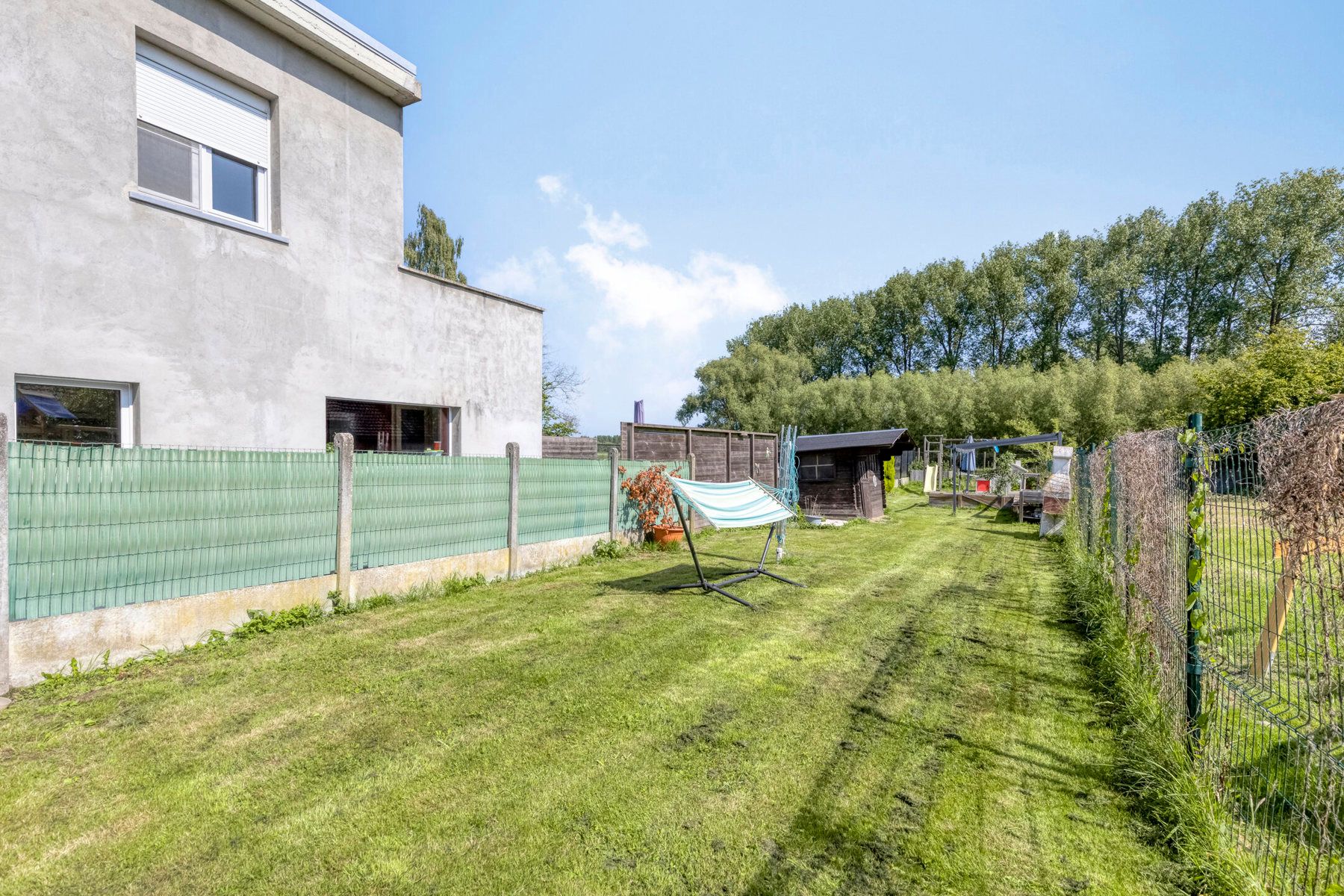 Half-open bebouwing met 3 slaapkamers en tuin! foto 16