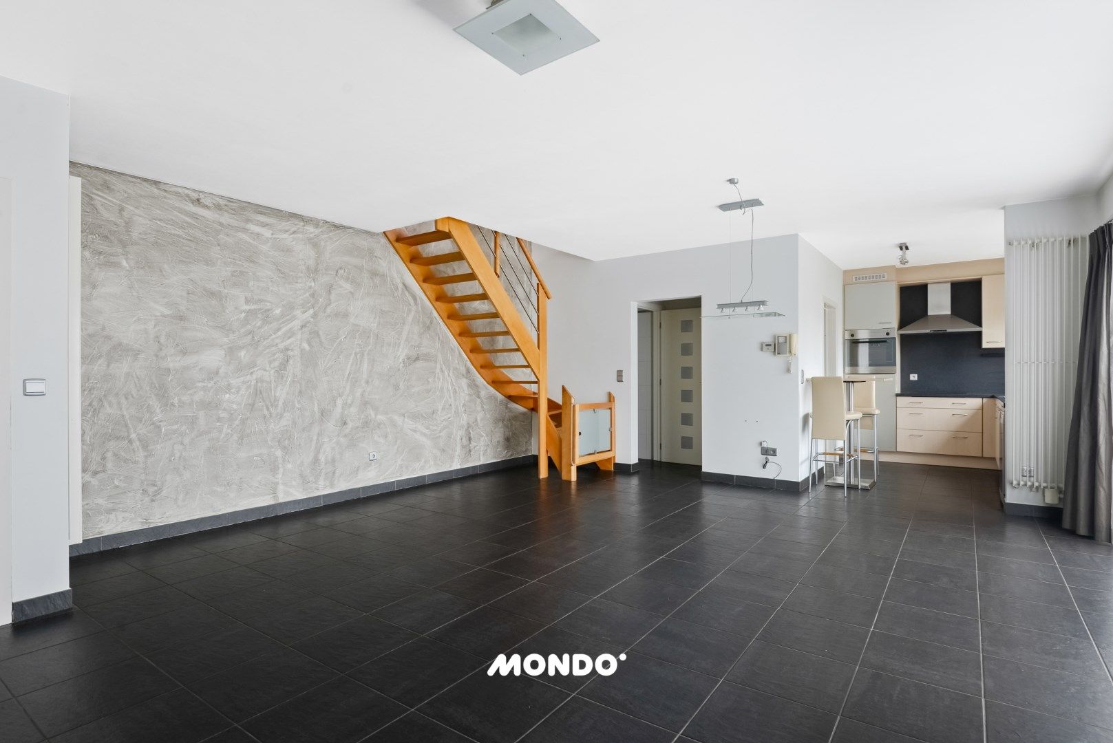 Ruim en energiezuinig duplexappartement te koop in het centrum van Steenhuffel – Inclusief overdekte privéparking foto 3