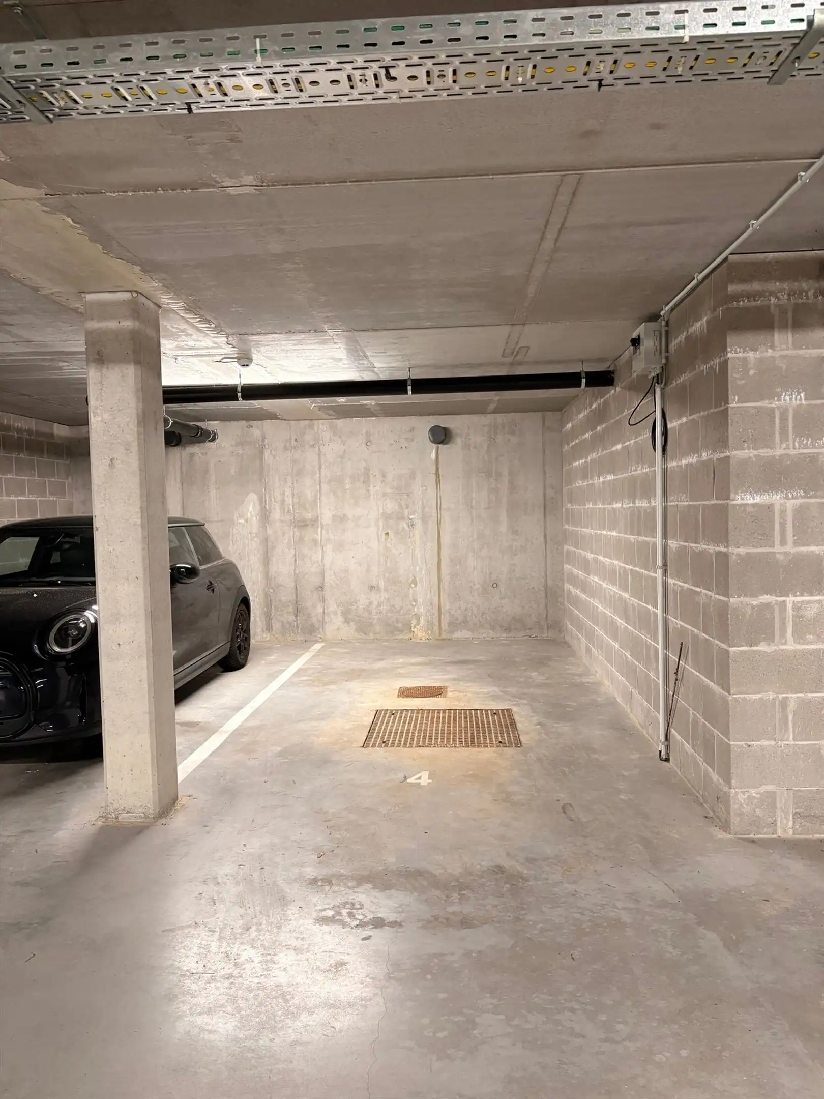 Modern en instapklaar gelijkvloers appartement met terras, tuin en ondergrondse staanplaats in Grembergen foto 15