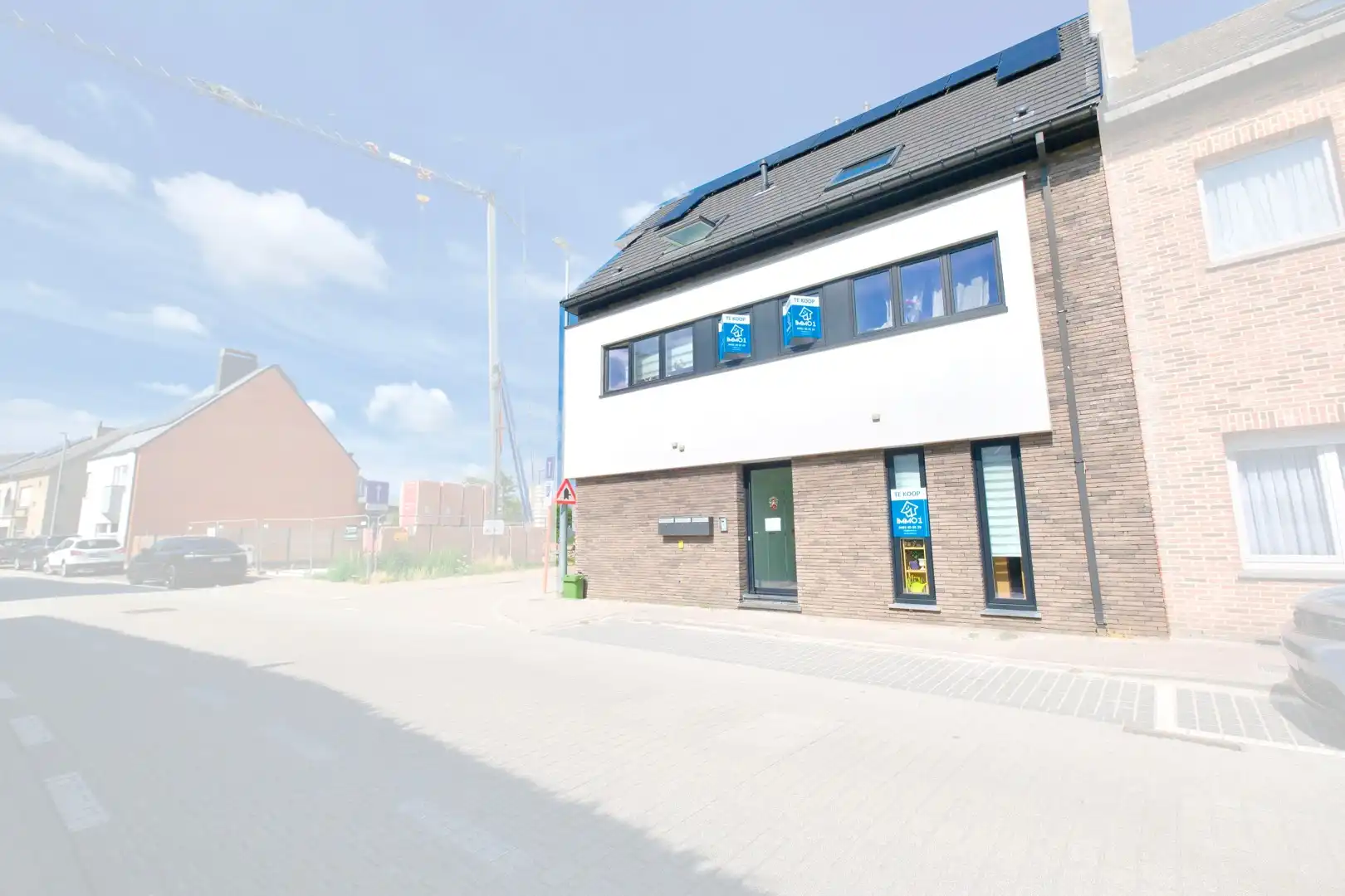 Denderleeuw - 3 verhuurde app in het centrum -> Rendement 2,85% foto {{pictureIndex}}