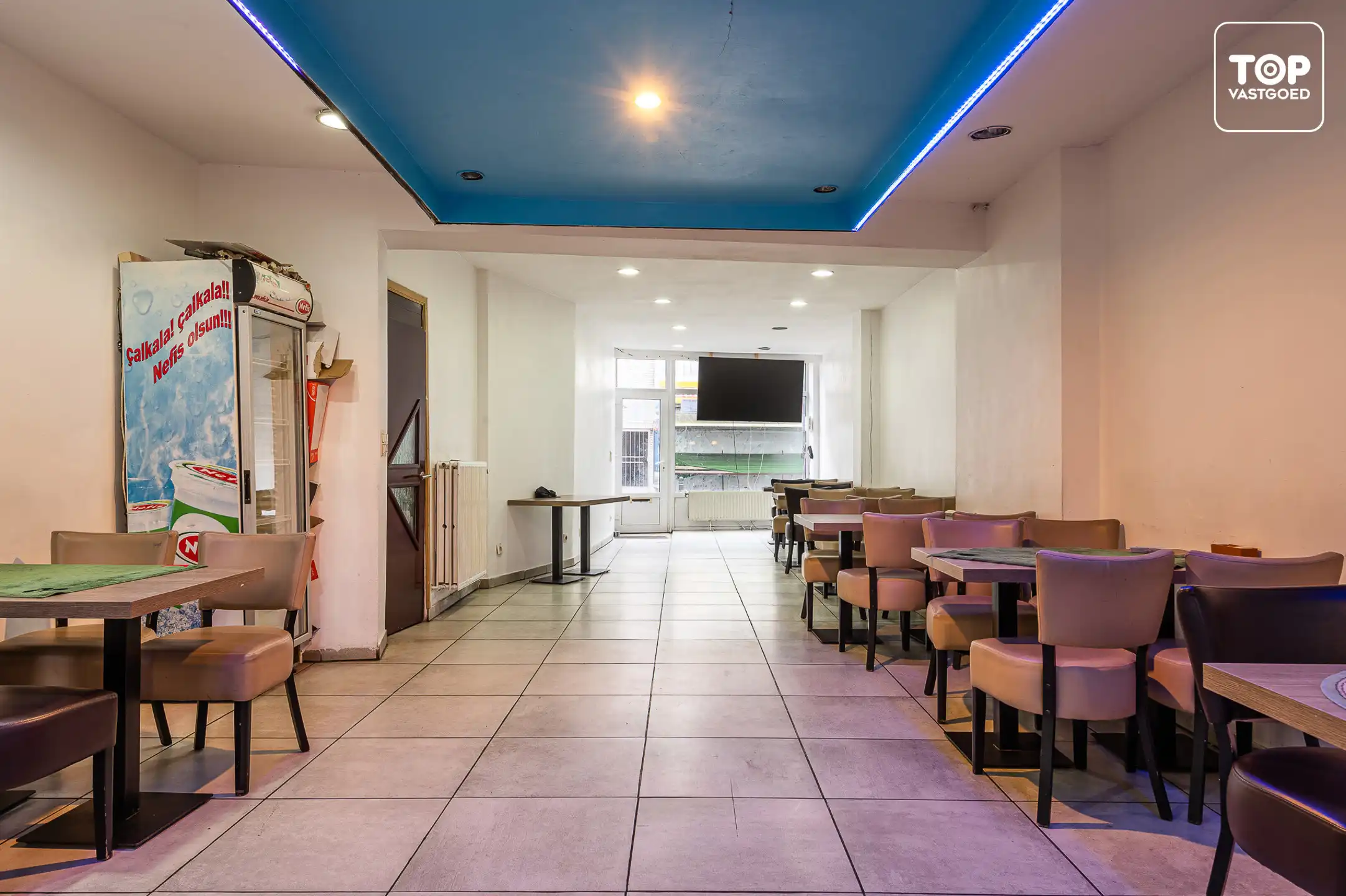 Centraal gelegen (opbrengst) eigendom met verhuurd handelsgelijkvloers en 2-slaapkamer woonst foto 2