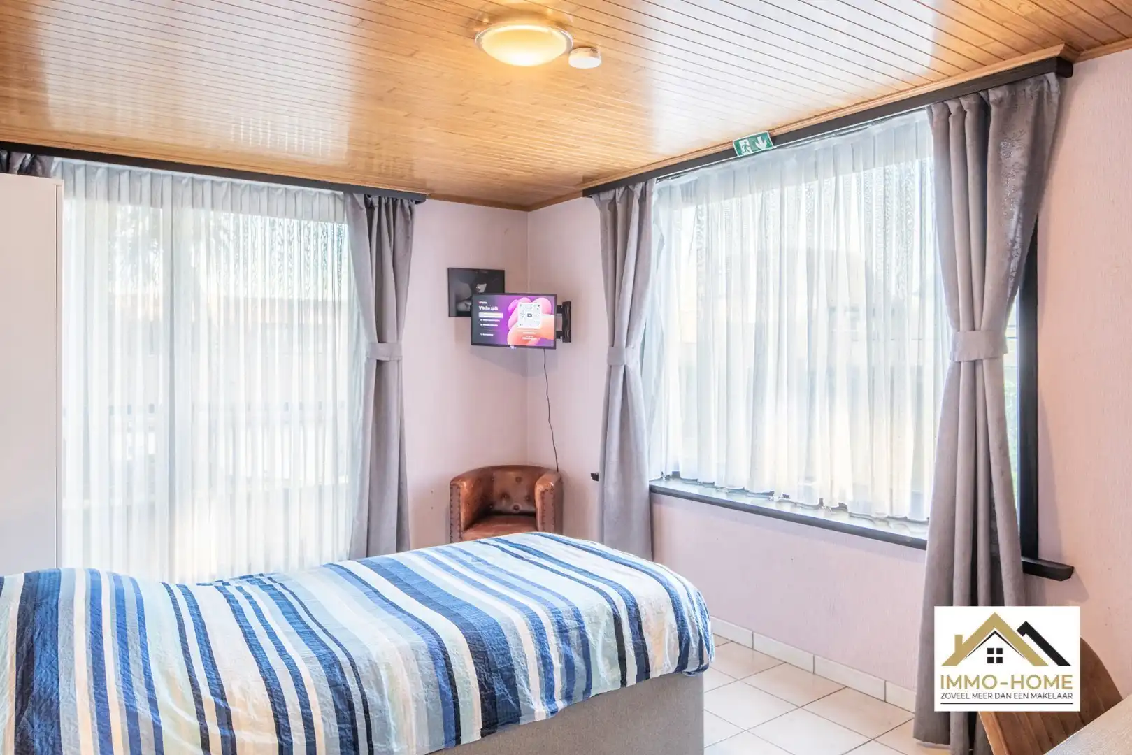 Zeer ruim gelijkvloers appartement met woonkelder en private tuin  foto 6