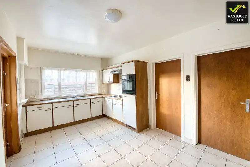 Te renoveren woning met tuin en garage in Sint-Laureins foto 5