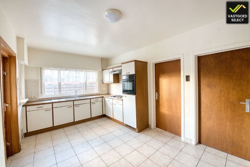 Te renoveren woning met tuin en garage in Sint-Laureins foto 5