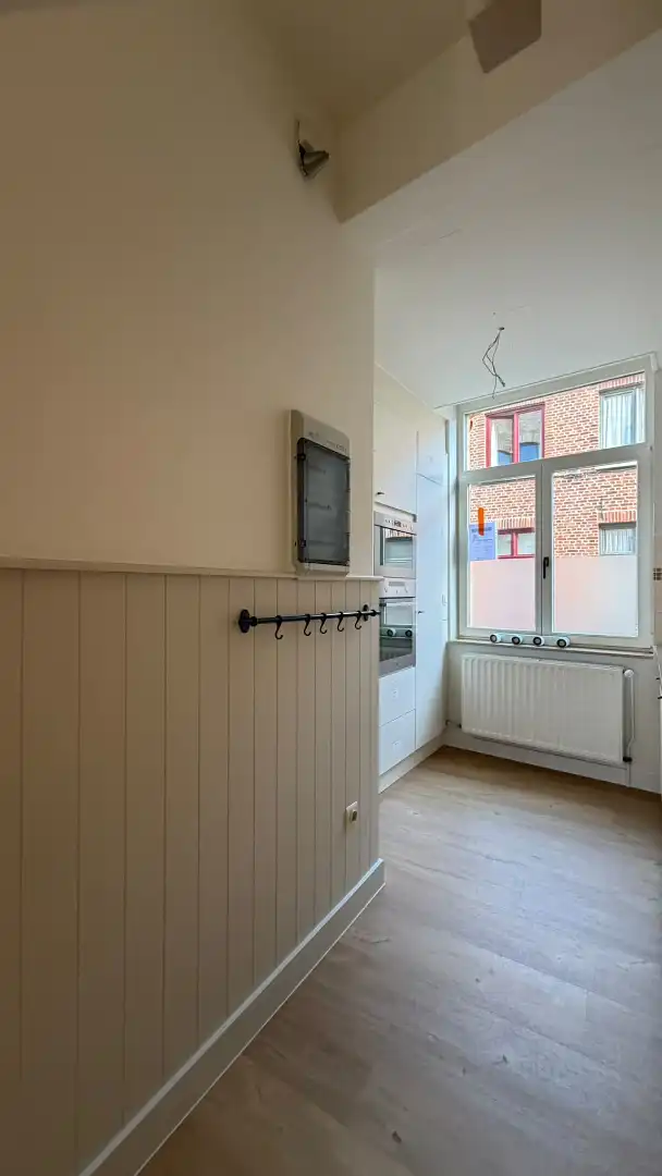 Instapklare trapgevelwoning met zonnig terrastuintje en grote berging, centrum, rustige straat omgeving ’t Zand foto 6
