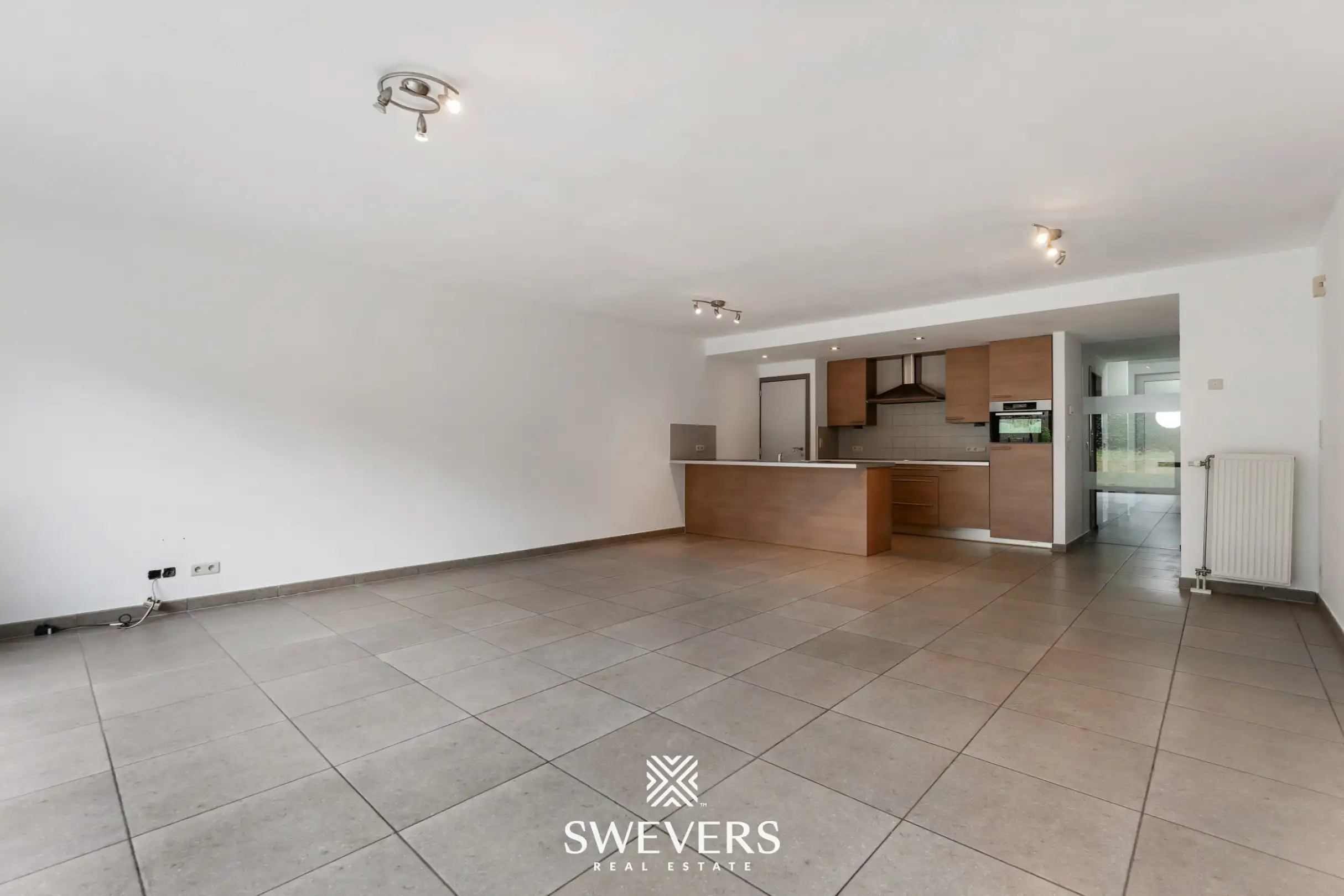 Ruim duplex appartement met 2 slaapkamers en tuin foto 2