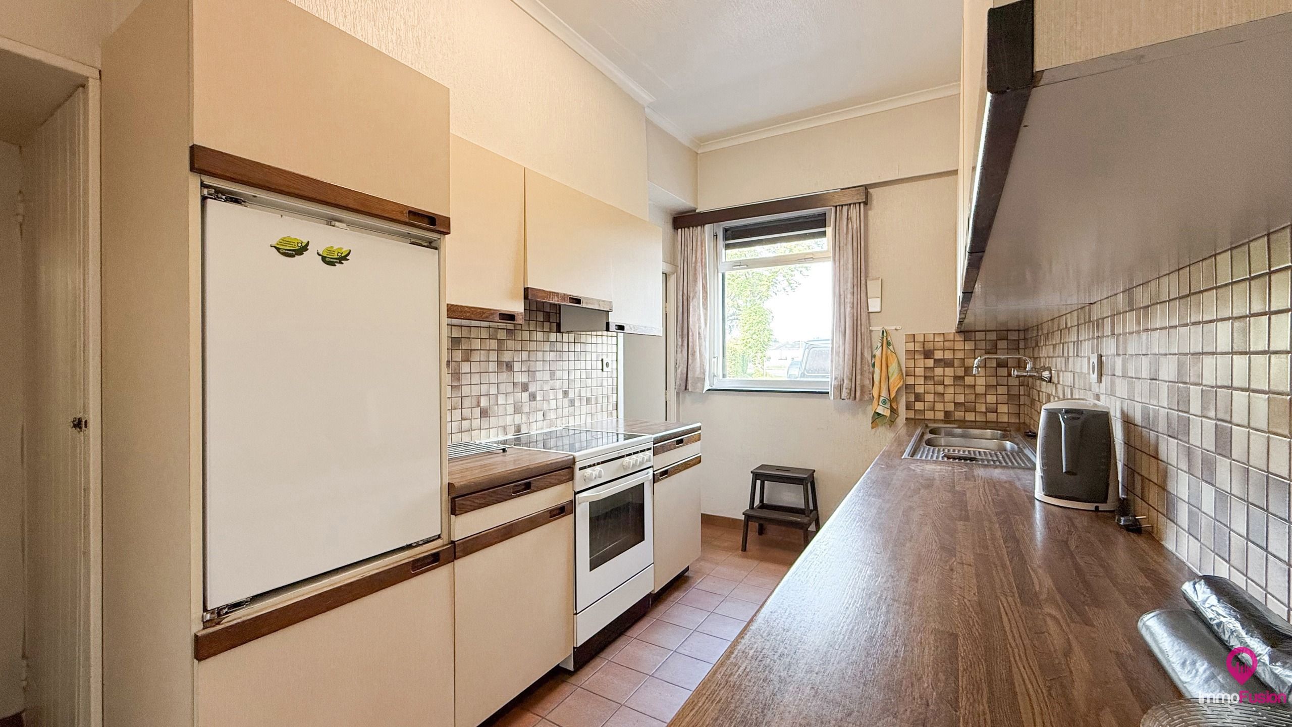 Ruime boerderij op ±33a met stallen en renovatiepotentieel! foto 8