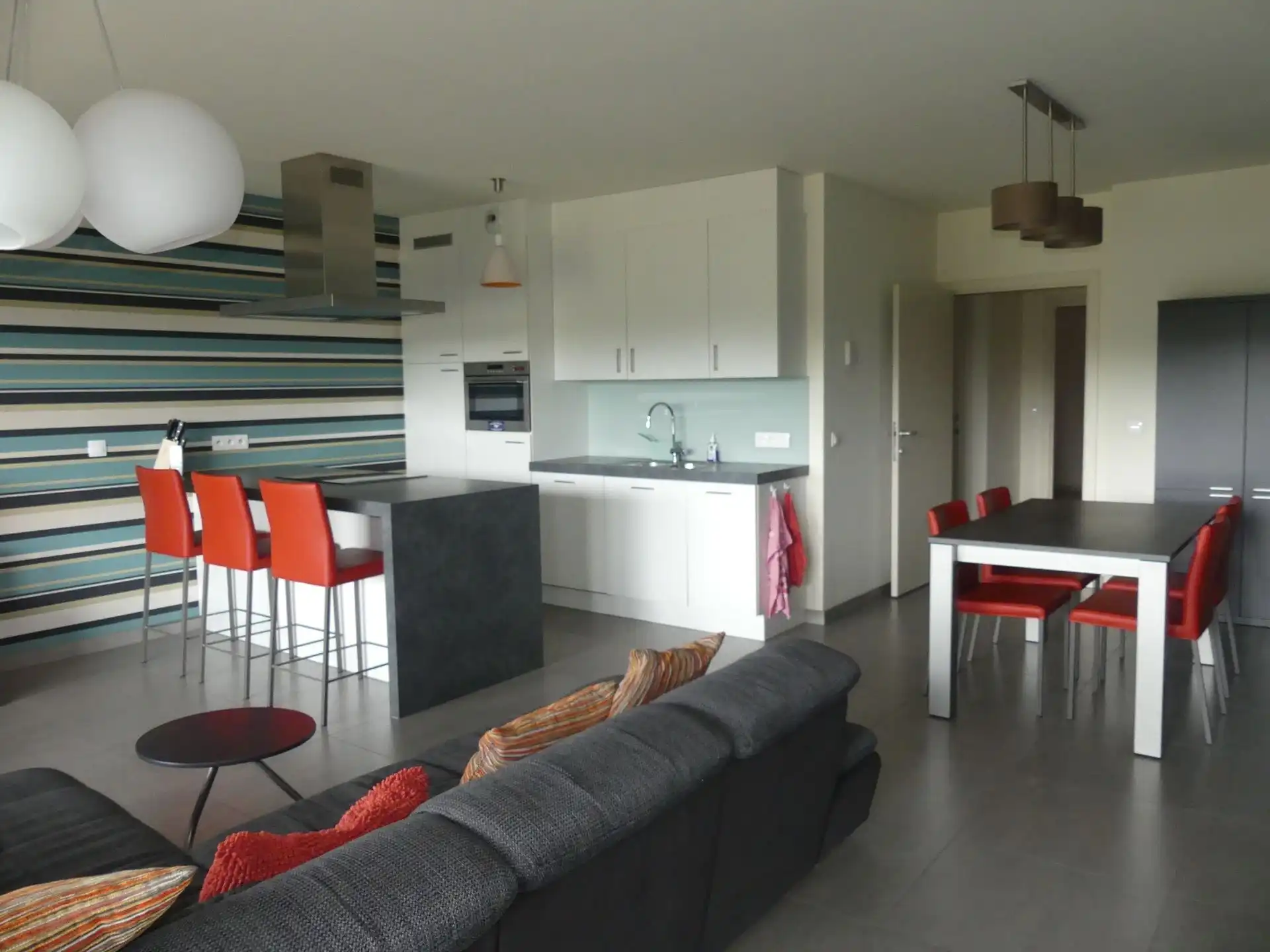 Instapklaar gelijkvloers appartement met zonnige tuin en uniek zicht op het water! foto 6