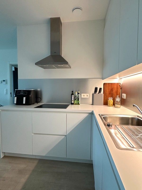 Hippe stadsmus(sen) gezocht voor 1 slaapkamer app. op 13° V met staanplaats en kelderberging foto 13