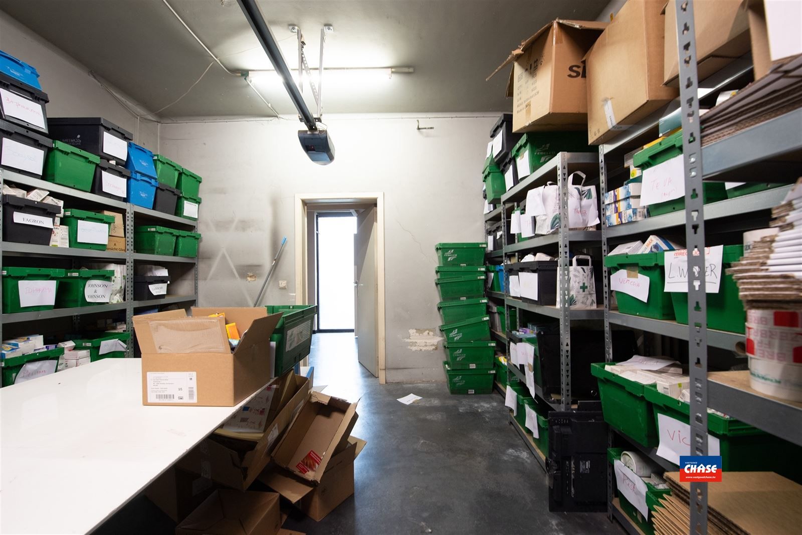 Handelshuis met groot appartement, garage en tuin foto 21