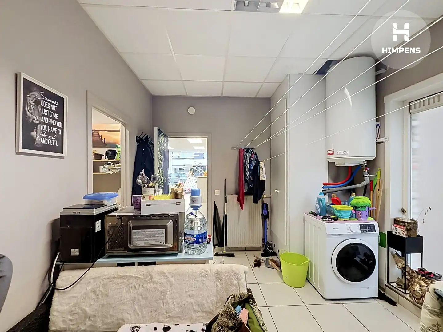 Verhuurd handelsgelijkvloers met dubbele garage in de Ooststraat foto 5
