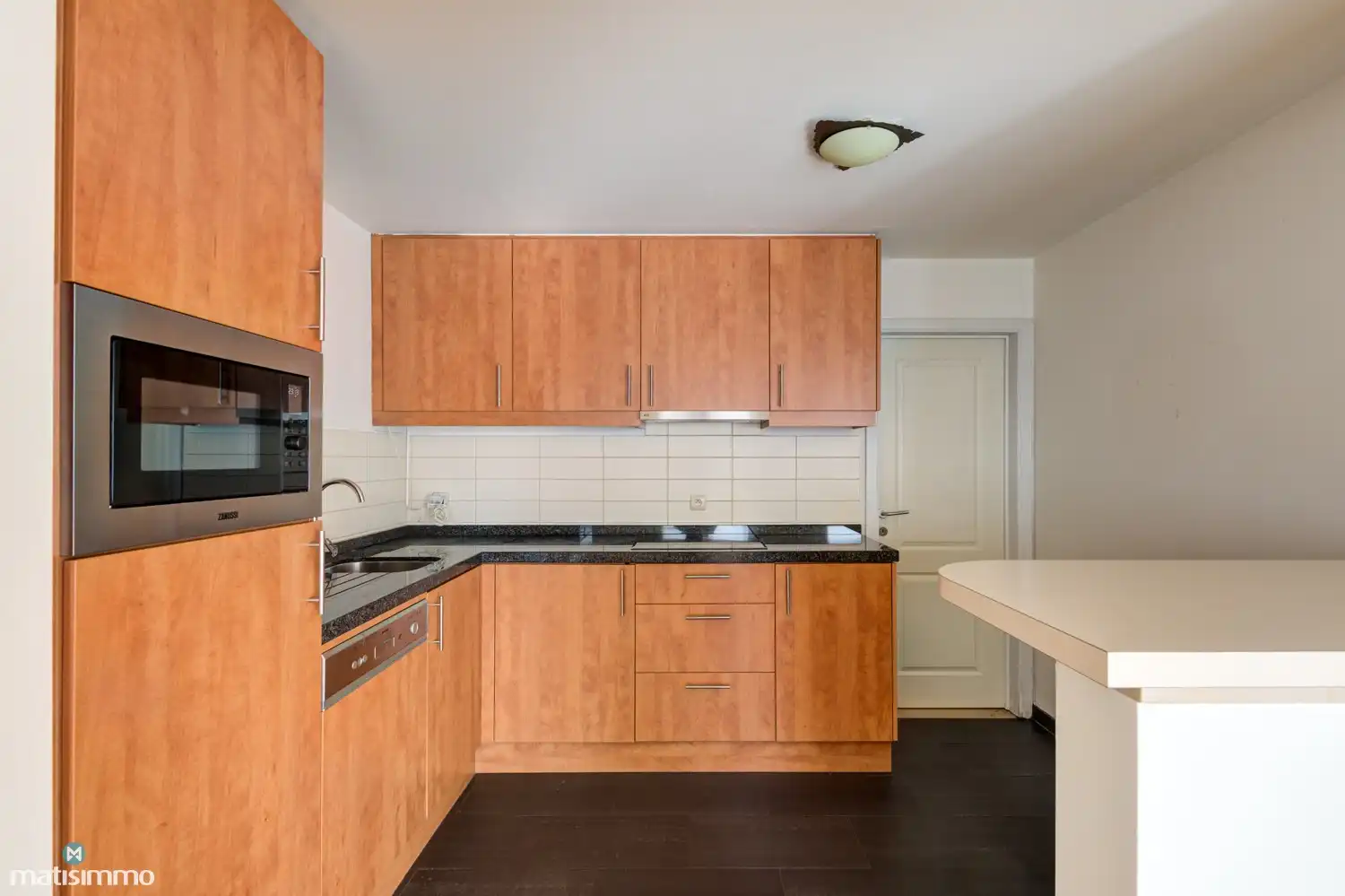 VERZORGD INSTAPKLAAR APPARTEMENT MET 2 SLAAPKAMERS EN RUIM TERRAS TE MUNSTERBILZEN foto 8