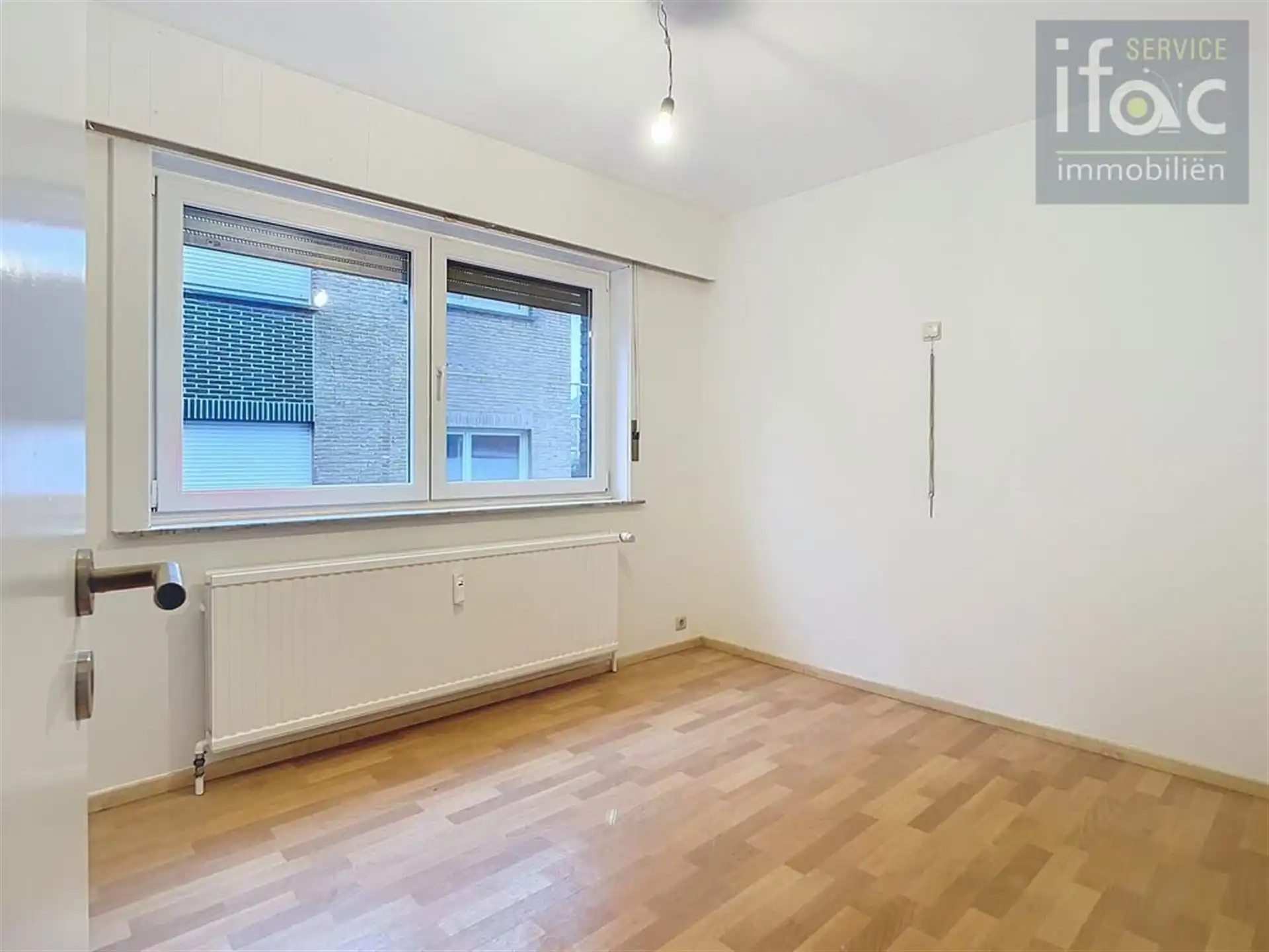 Gerenoveerd appartement met 2 slaapkamers, tuin en garage  foto 6