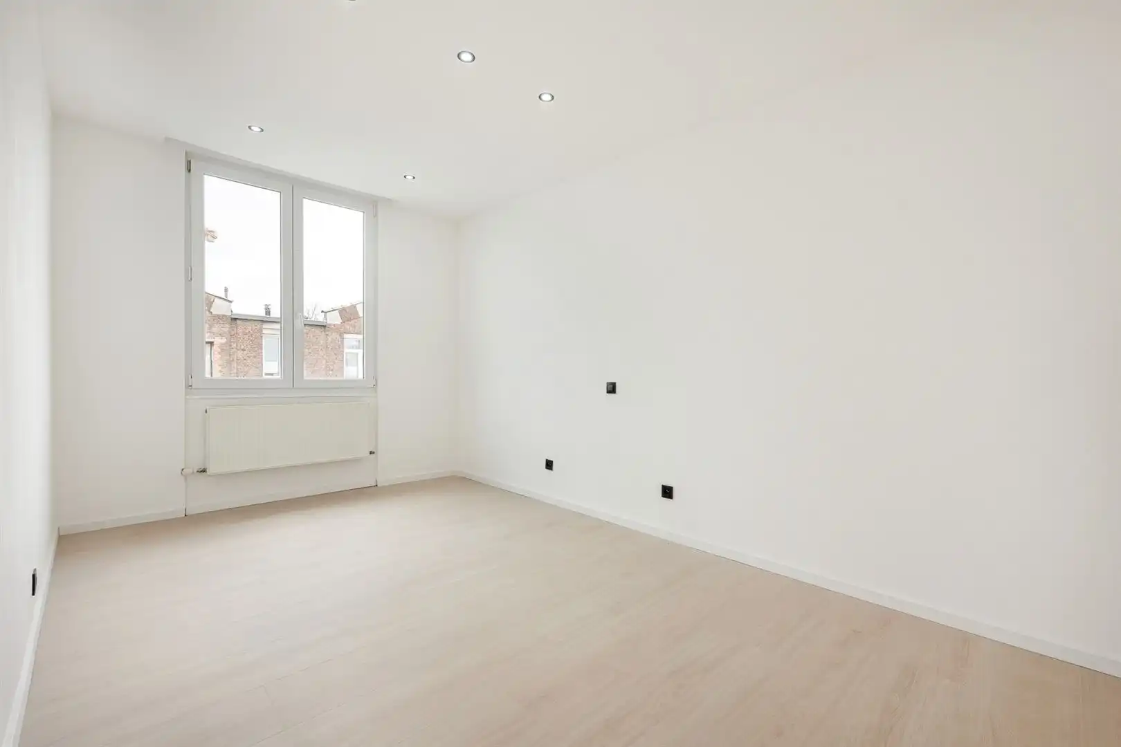 Volledig gerenoveerd & Energiezuinig: Ruime gezinswoning met 3 slaapkamers foto 15