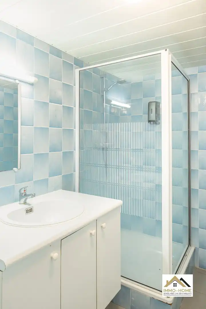 Zeer ruim gelijkvloers appartement met woonkelder en private tuin  foto 22
