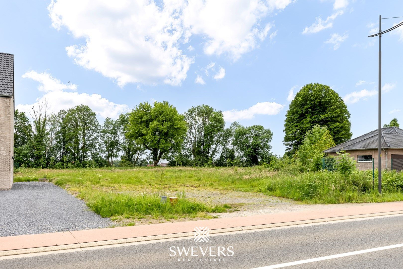 Zuidelijk georiënteerde bouwgrond van 5a in Bilzen foto 2