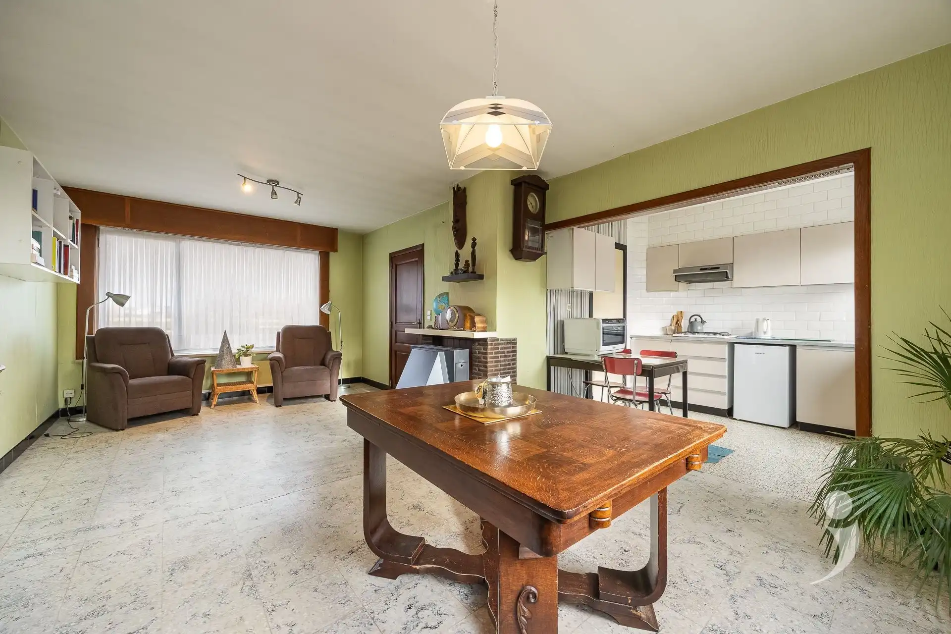 Te renoveren woning met oprit en tuin in Herent foto 2