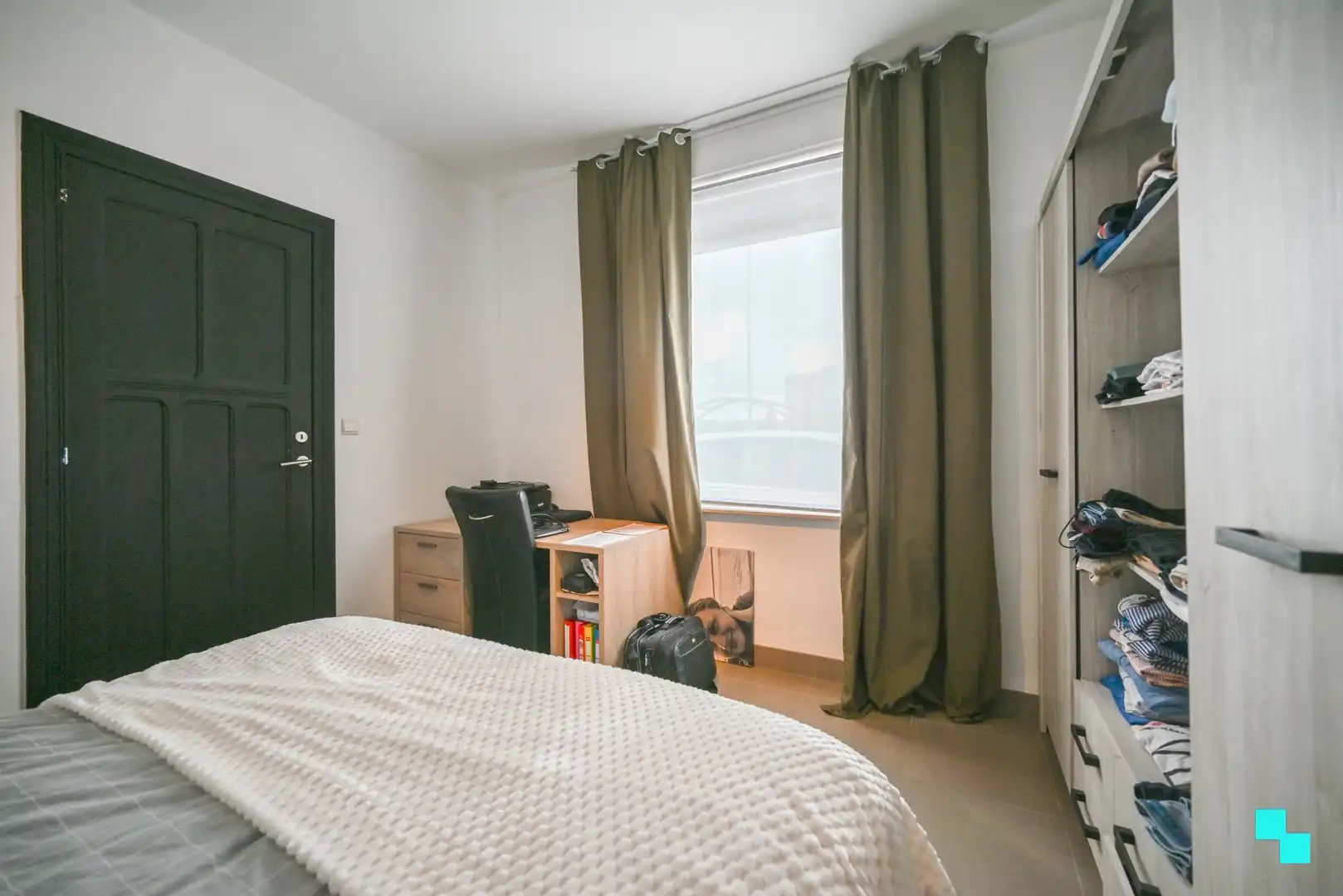 Gelijkvloerse woning met uitweg achteraan in Wielsbeke foto 16