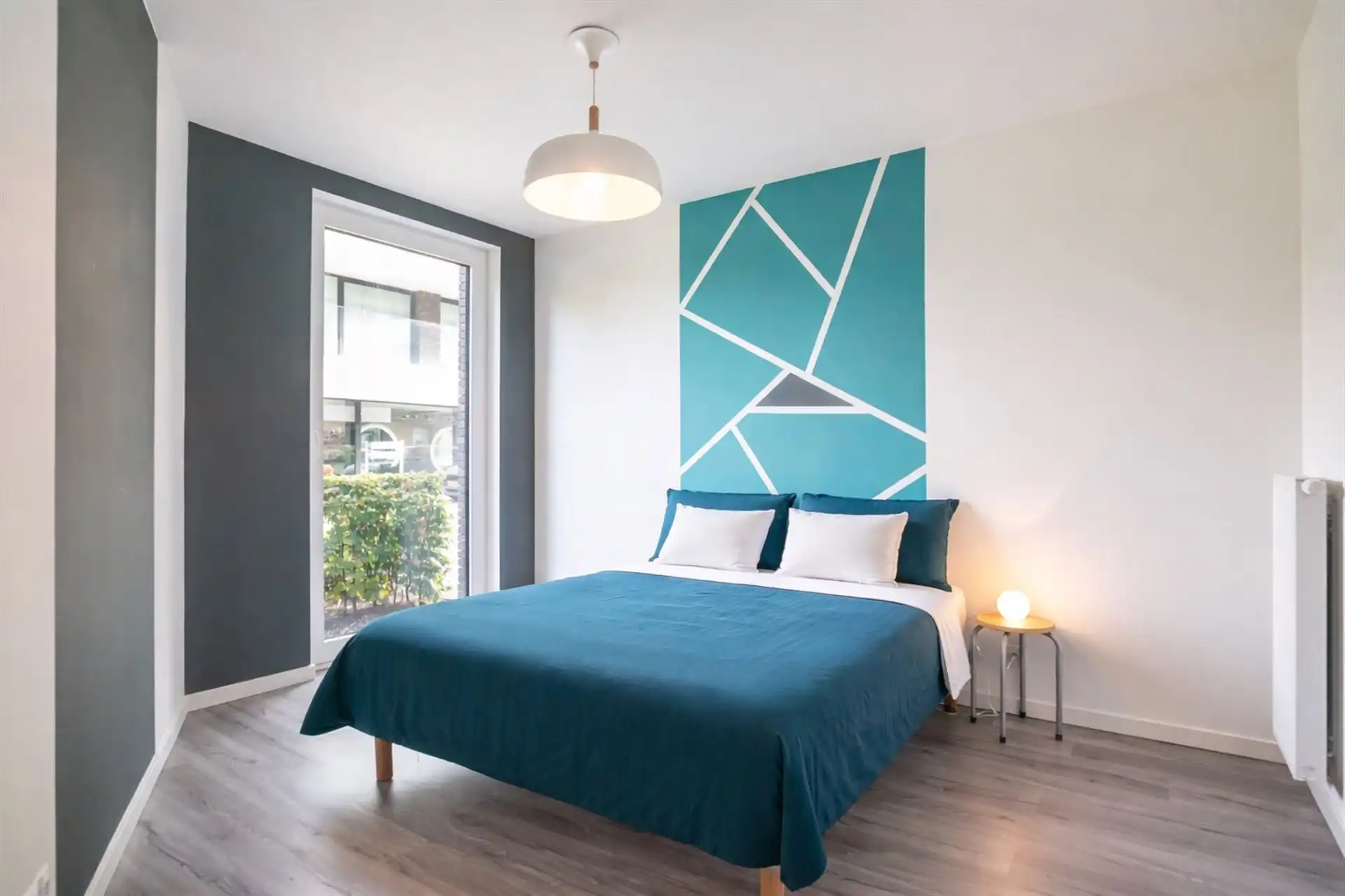 Lichtrijk gelijkvloers appartement met terras en tuinzicht foto 16