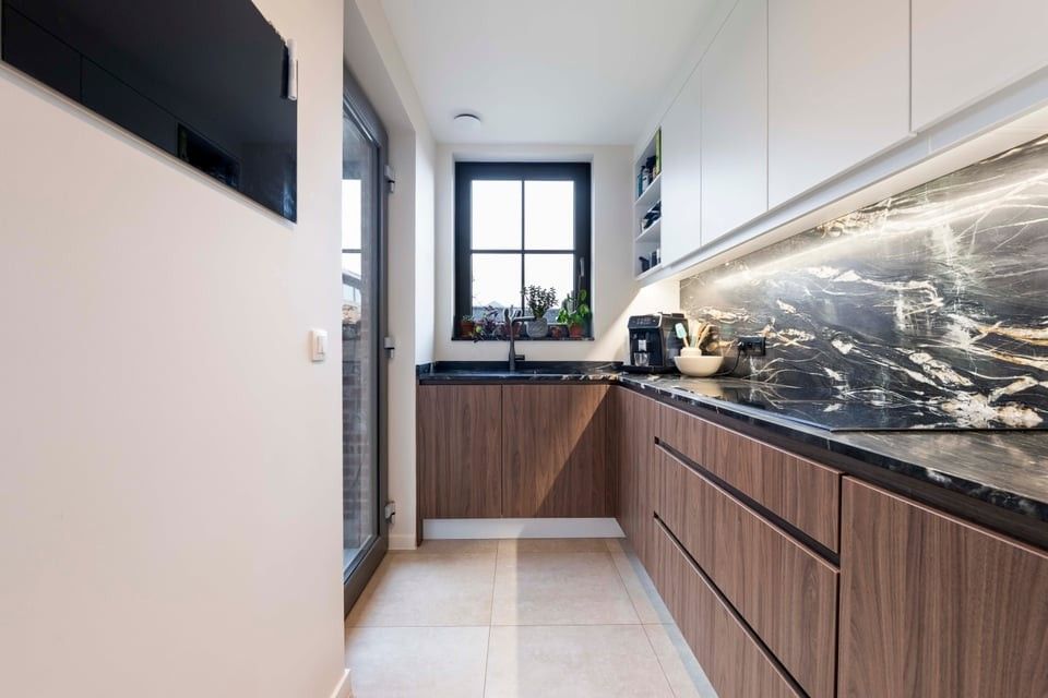 PRACHTIG NIEUWBOUWAPPARTEMENT MET 2 SLKS EN EEN STAANPLAATS IN HET LANDELIJKE HEERS foto 11