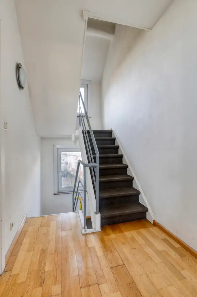 Handelsruimte met woonst foto 9