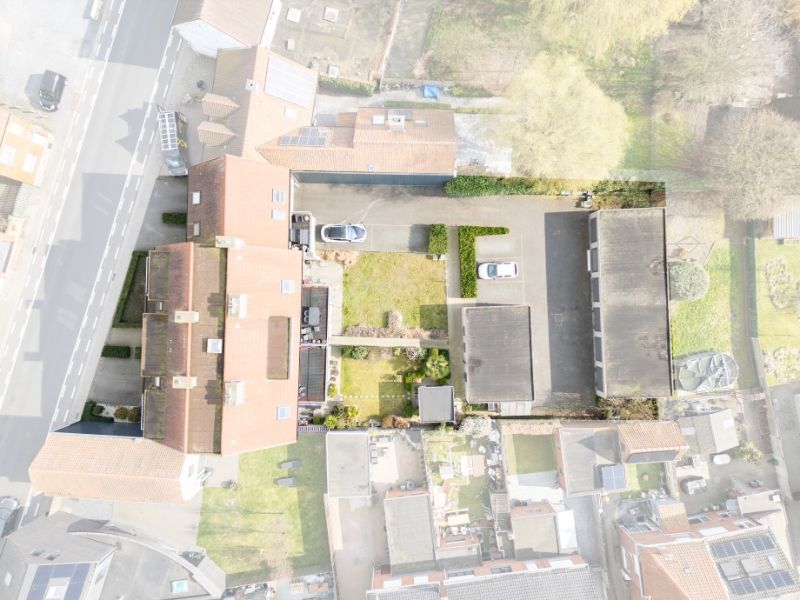 Opbrengsteigendom met 7 verhuurde appartementen, afzonderlijke garageboxen en staanplaatsen te Zelzate. foto 6