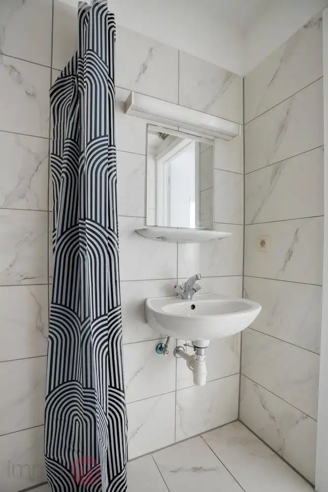 Volledig vernieuwde, instapklare studio in hartje Leuven met afgesloten garagebox – rustig gelegen pareltje! foto 12