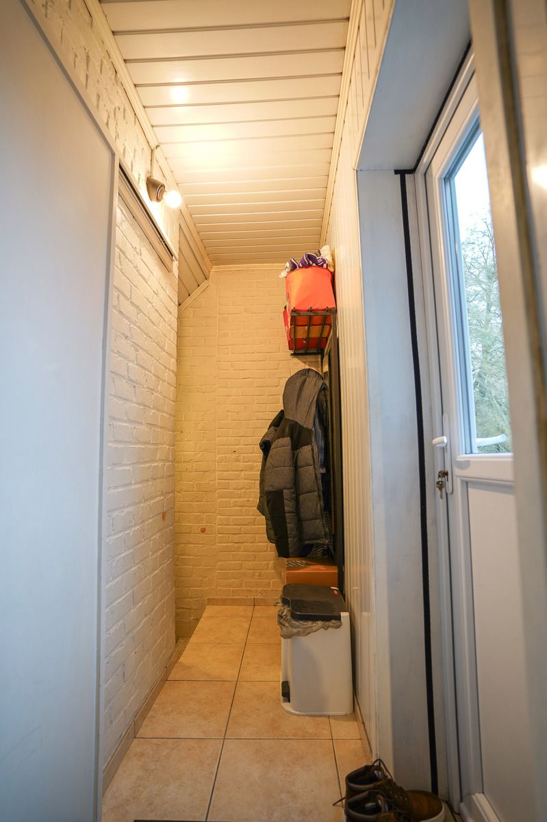 2 aansluitende, op te frissen woningen met loods in Buggenhout foto 12