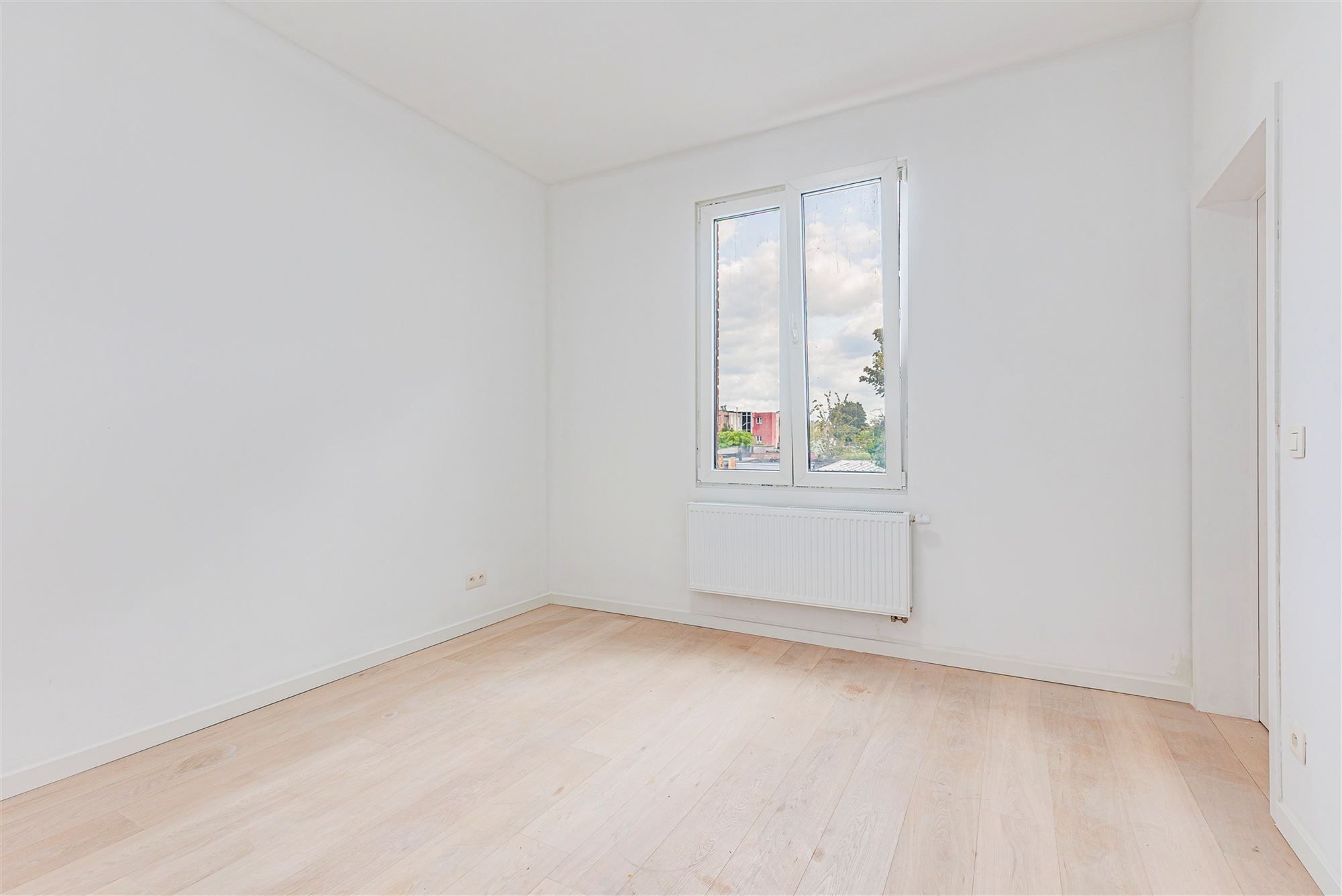 Gelijkvloers duplexappt met 3 slk + tuin foto 13