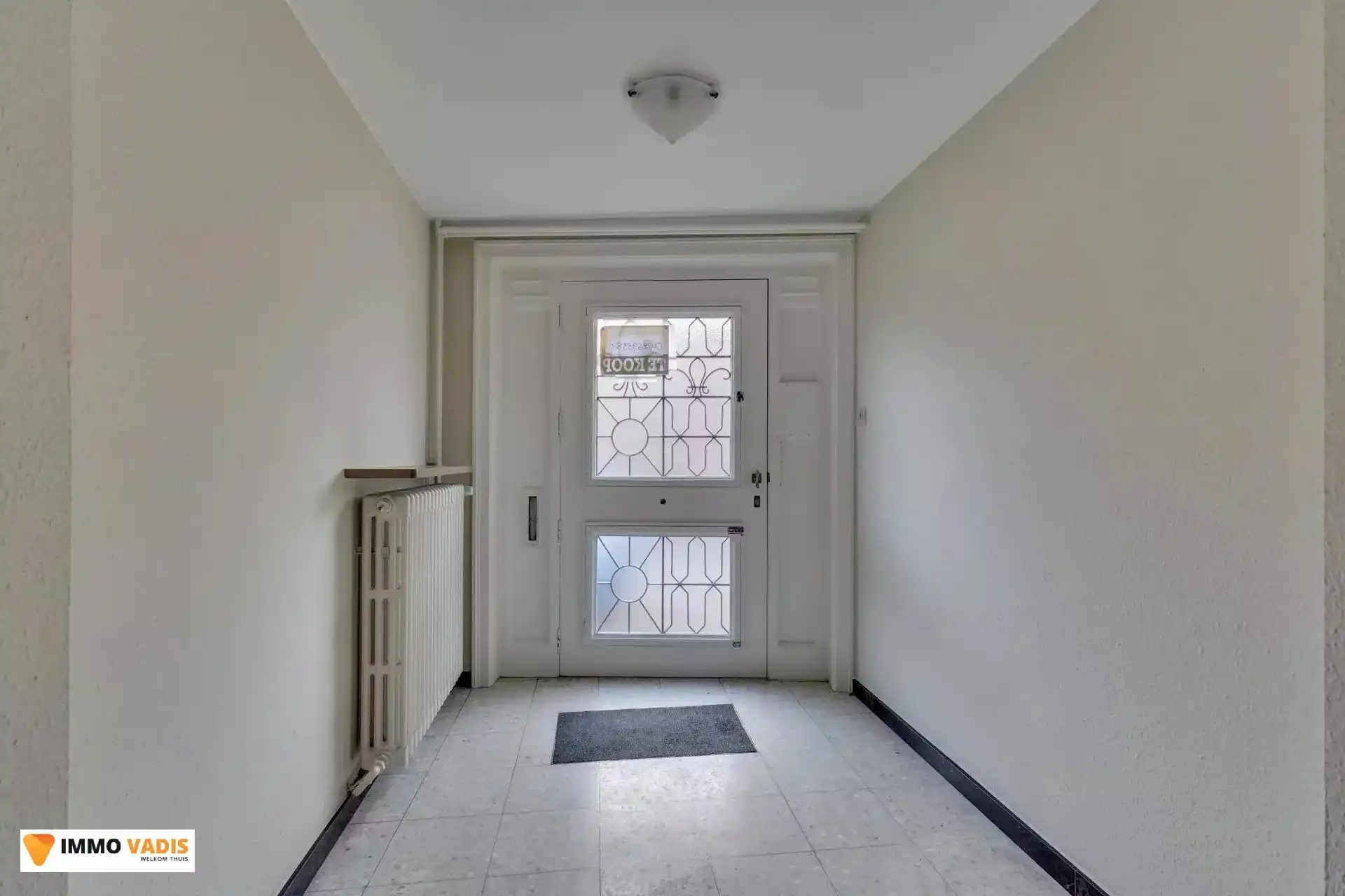 Karaktervolle herenwoning met vier slaapkamers, inpandige garage en tuin foto 2