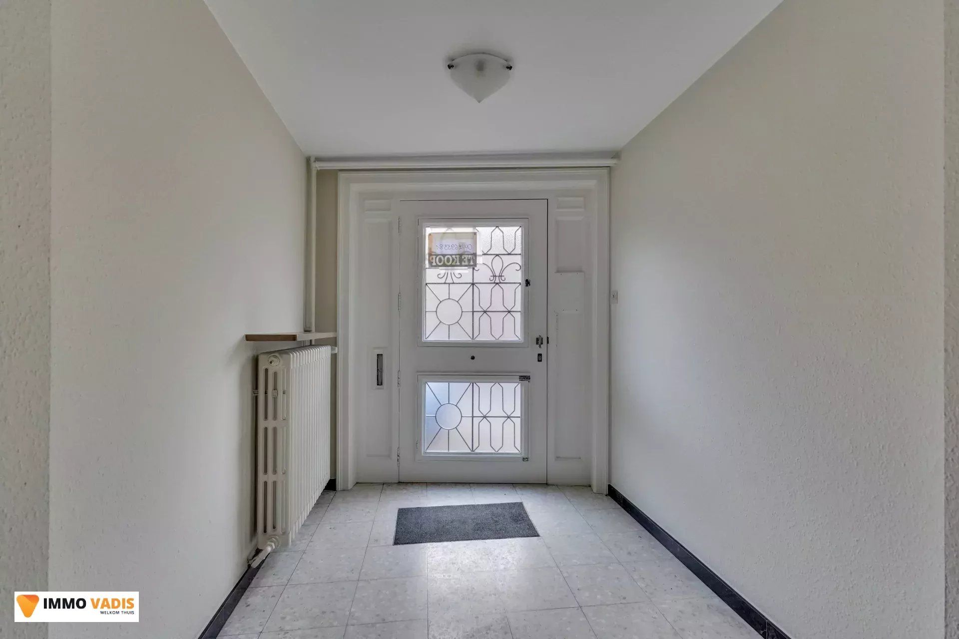 Karaktervolle herenwoning met vier slaapkamers, inpandige garage en tuin foto 2