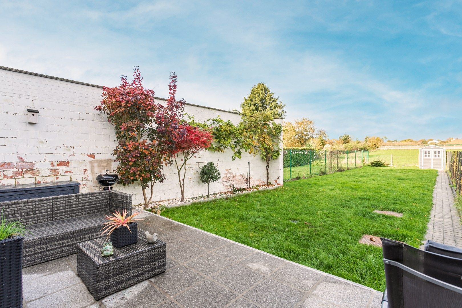 Instapklare woning met 4 slpk, tuin en parking foto 11