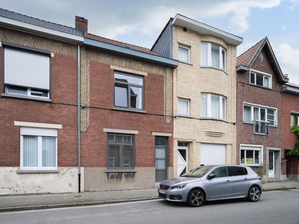 Instapklare en energiezuinige woning met 3 slaapkamers en aangename tuin, gelegen in een opkomende buurt aan de Muide. foto 21