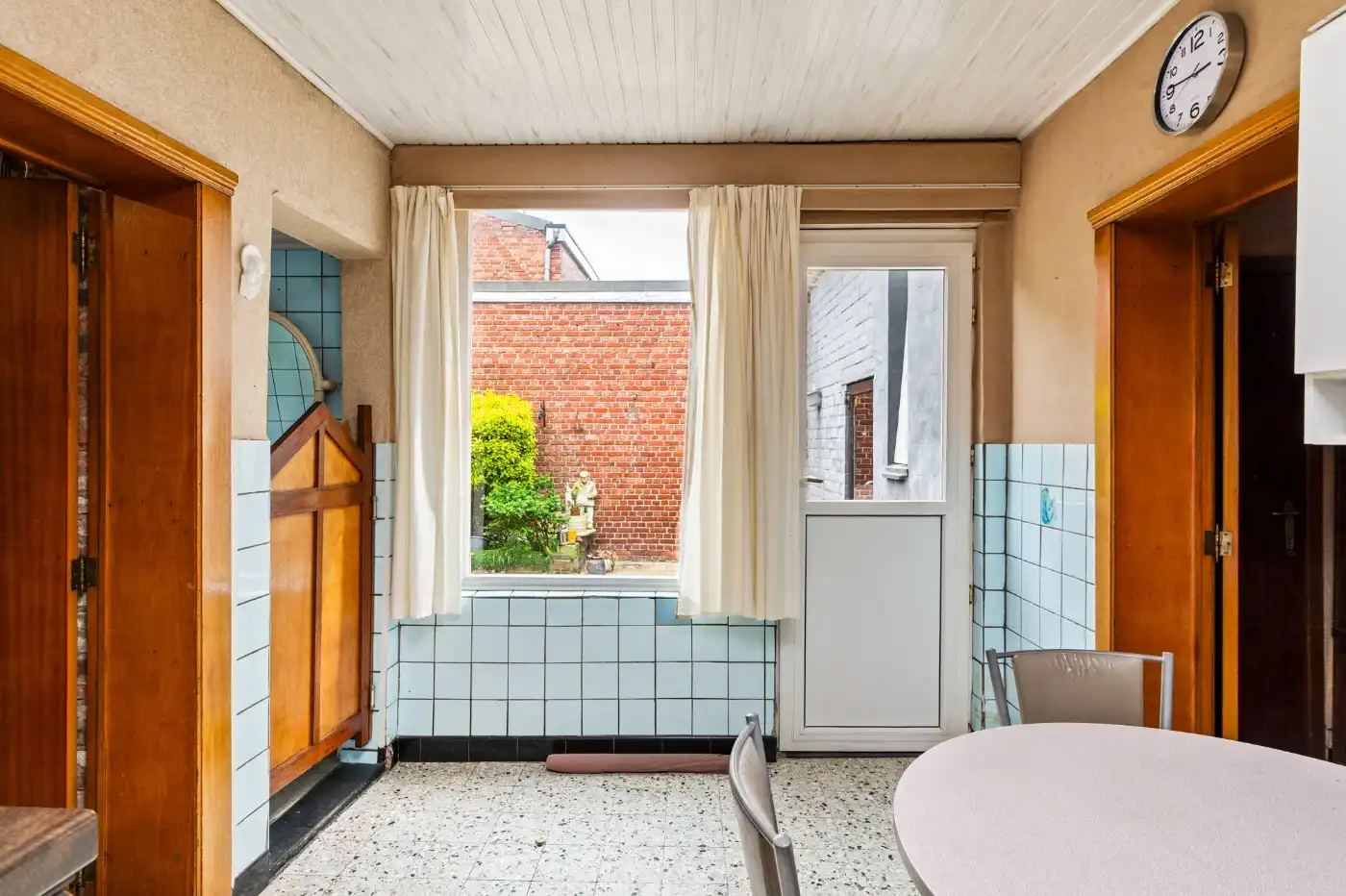 Te renoveren woning met 3 slpk., stadstuin en garage foto 10