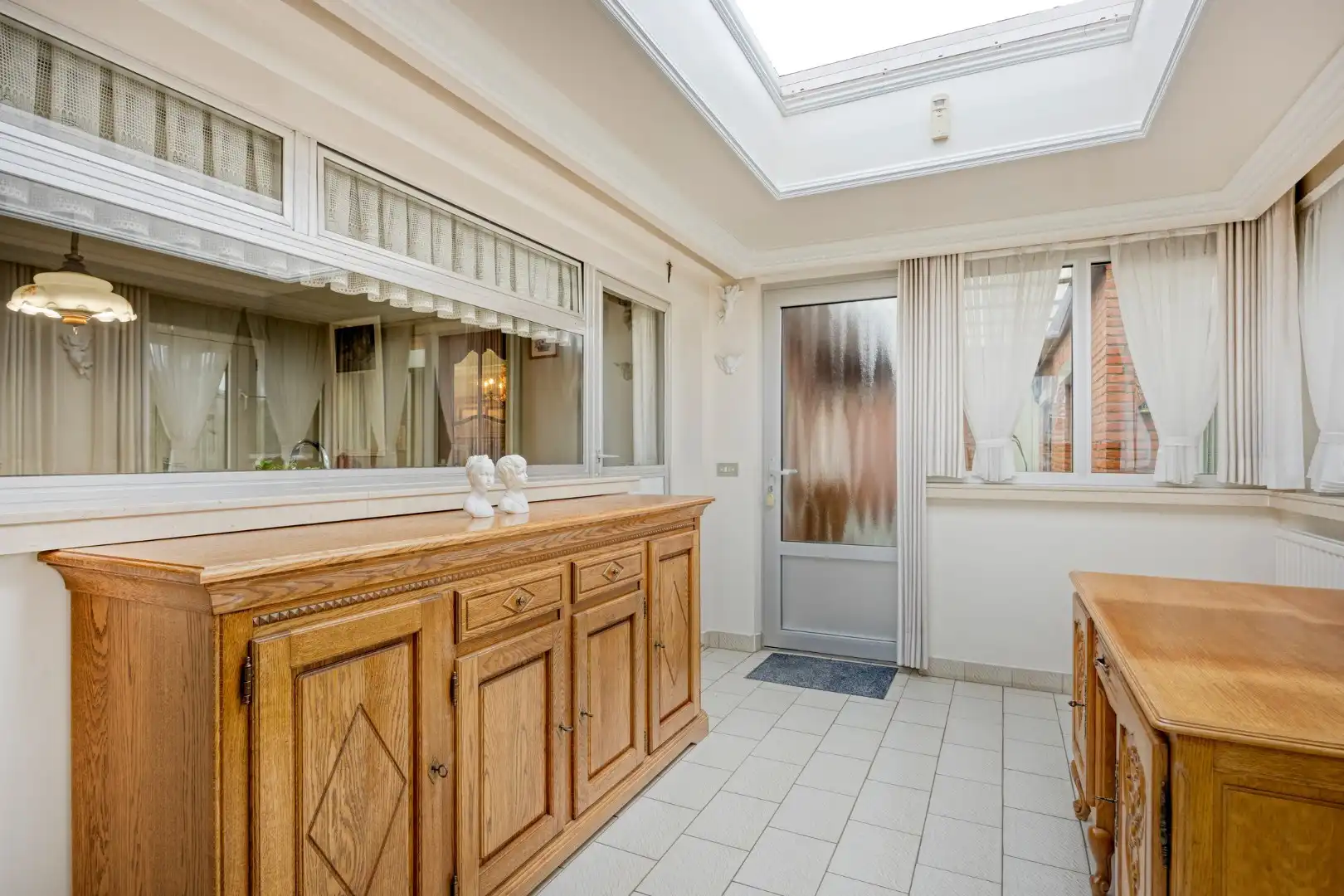 Ruim ingedeelde gelijkvloers woning op een mooi breed perceel van 812 m². foto 15