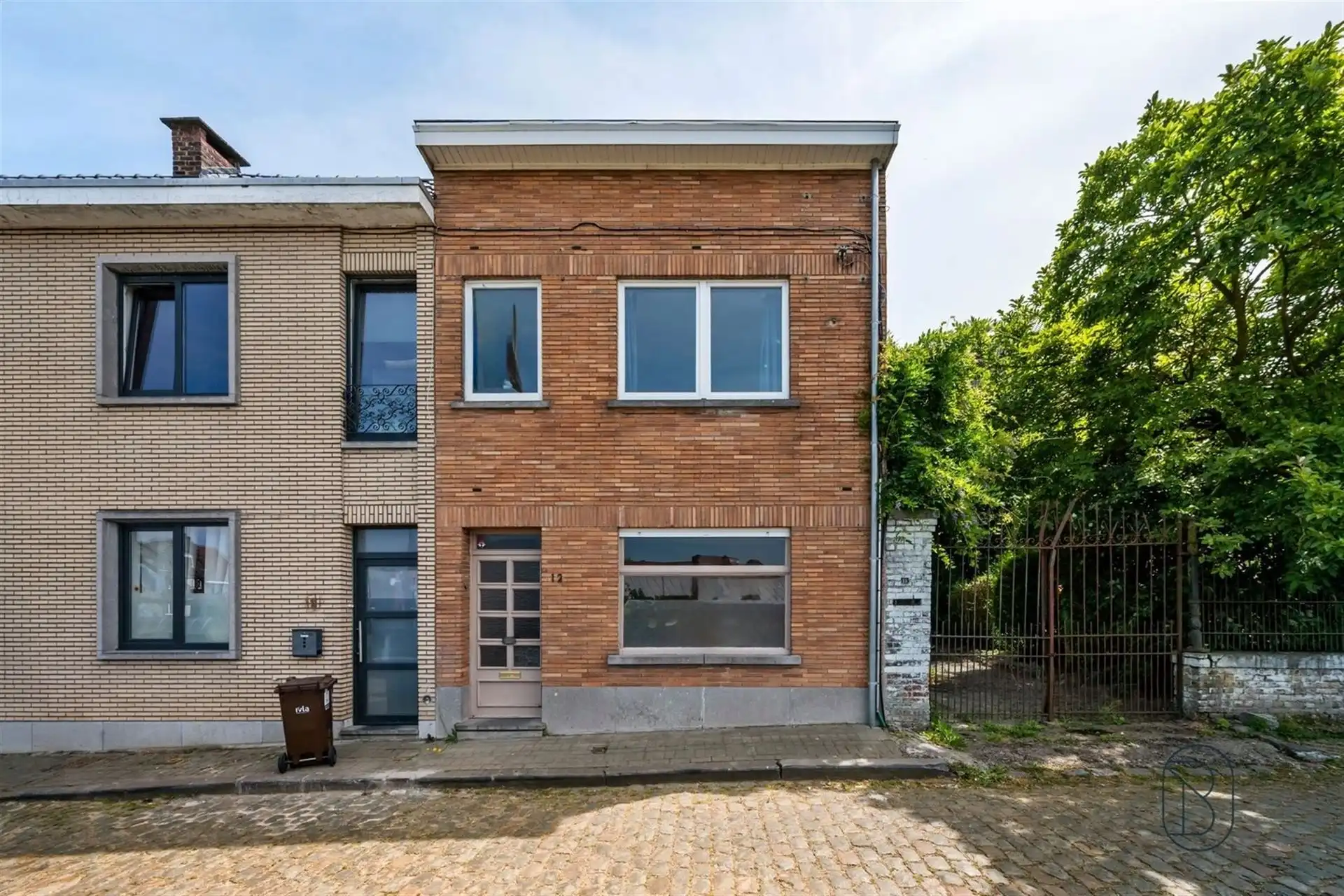Te renoveren woning met 3 SLK, stadstuin en veel potentieel foto 3