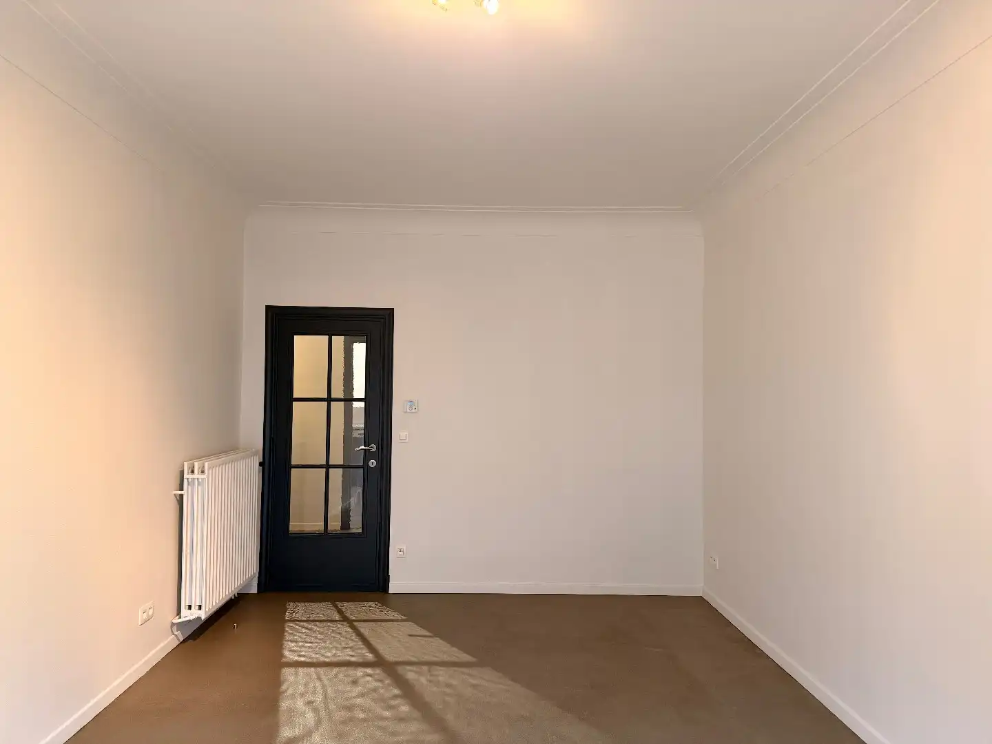 Verzorgd gelijkvloers appartement met tuin  foto 3