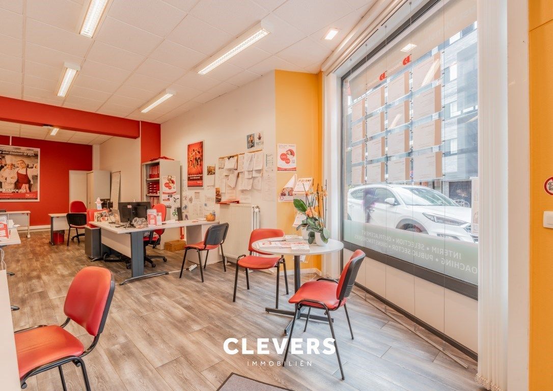 Opbrengsteigendom met lopende handelshuur + 2 appartementen foto 6