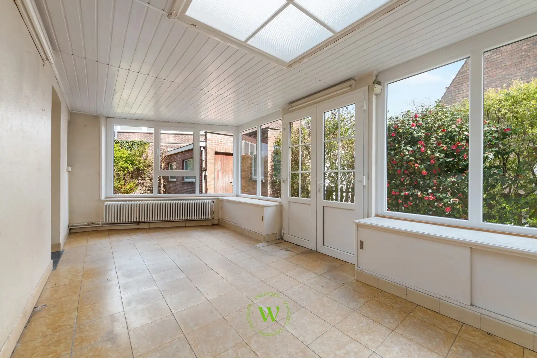 Verrassende en charmante halfopen bebouwing te Assebroek. foto 8