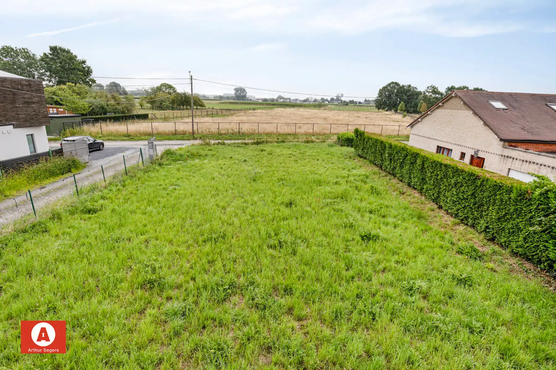 Landelijk gelegen bouwgrond voor open bebouwing (12a 42ca) foto {{pictureIndex}}
