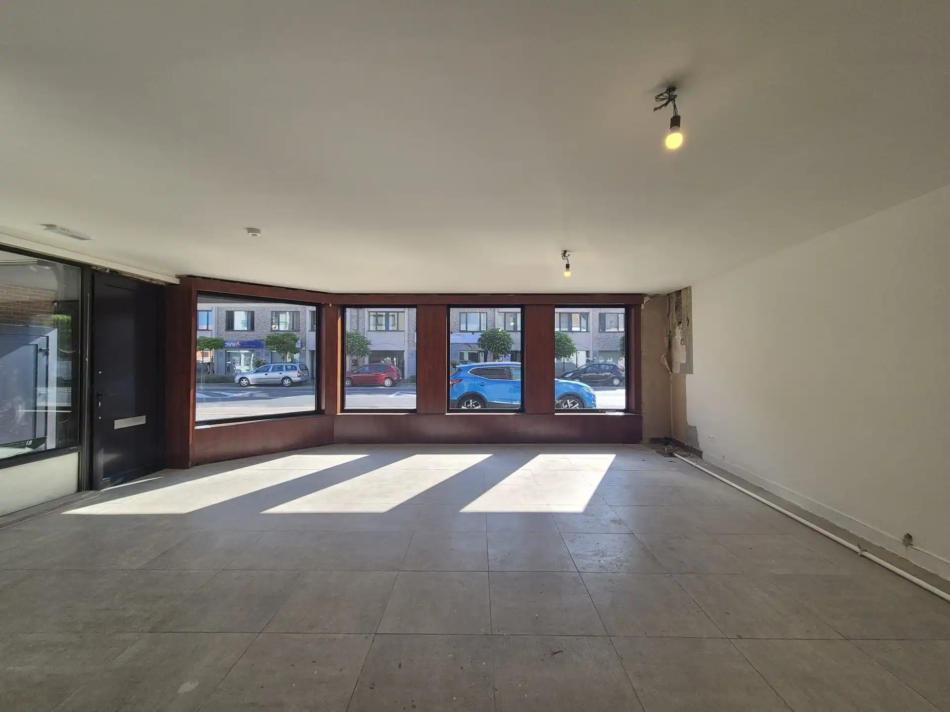Ruim triplex appartement met polyvalente ruimte op toplocatie in het hart van Wetteren foto 5