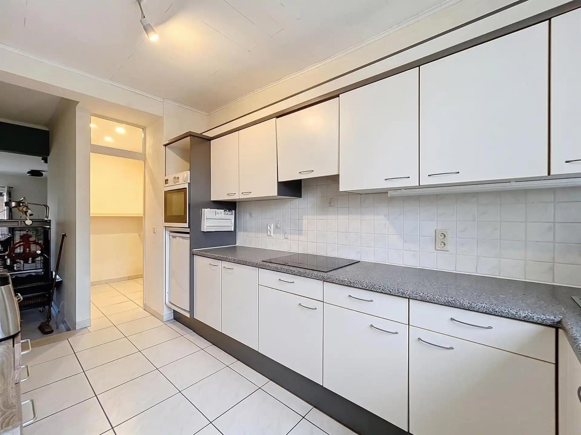 OPBRENGSTEIGENDOM MET 3 VOLLEDIG VERHUURDE APPARTEMENTEN – UITSTEKENDE INVESTERING IN SINT-PAUWELS foto 18