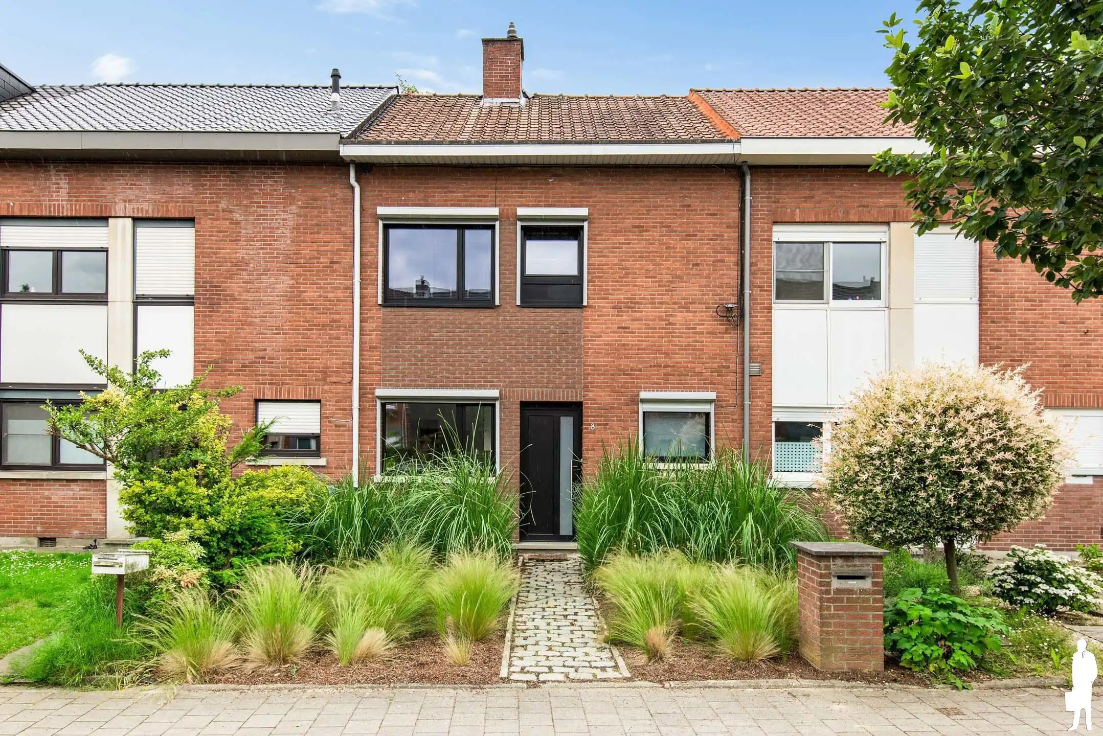 Instapklare gezinswoning met 3 slaapkamers en gezellige tuin foto 2