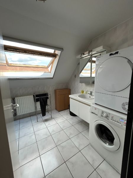 Prachtig 1 slpk dakappartement met terras (±40m²), garage en lift. foto 9